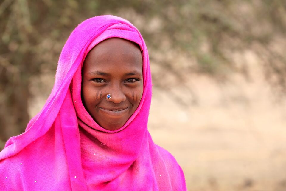 Young woman in a pink headscarf in Guinea-Conakry